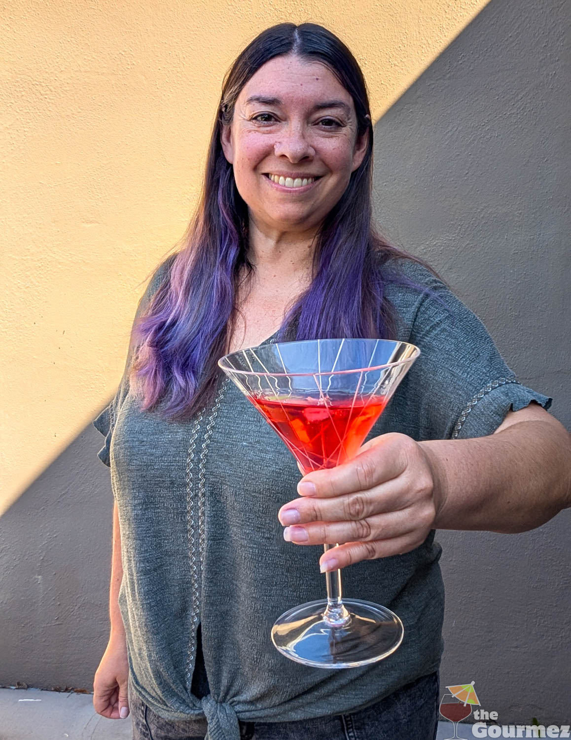 the gourmez serves drink cosmopolitan rebecca gomez farrell